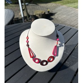 Halsk�de i tagua n�dder cyklame
