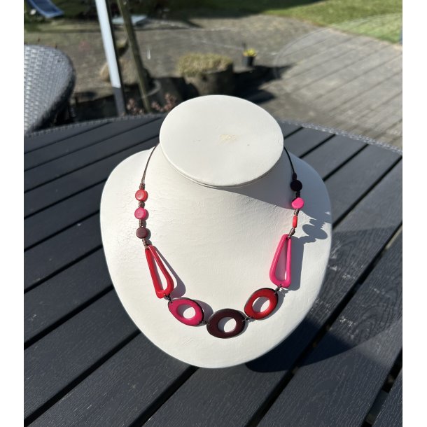 Halsk�de i tagua n�dder cyklame