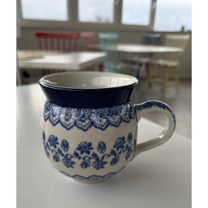 Krus i polsk stent�j med blomsterb�nd. 